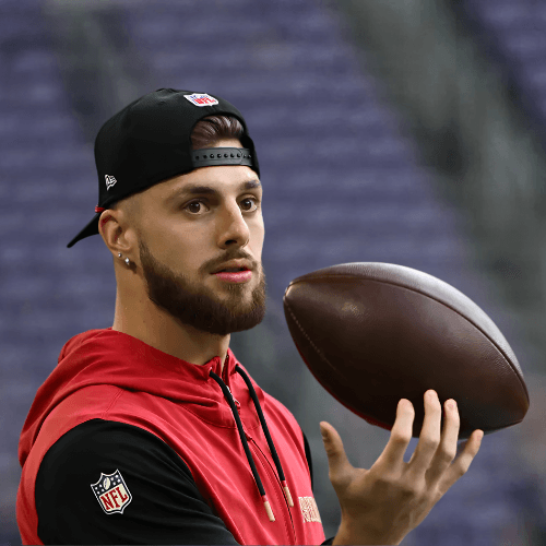 Ricky Pearsall holding a football