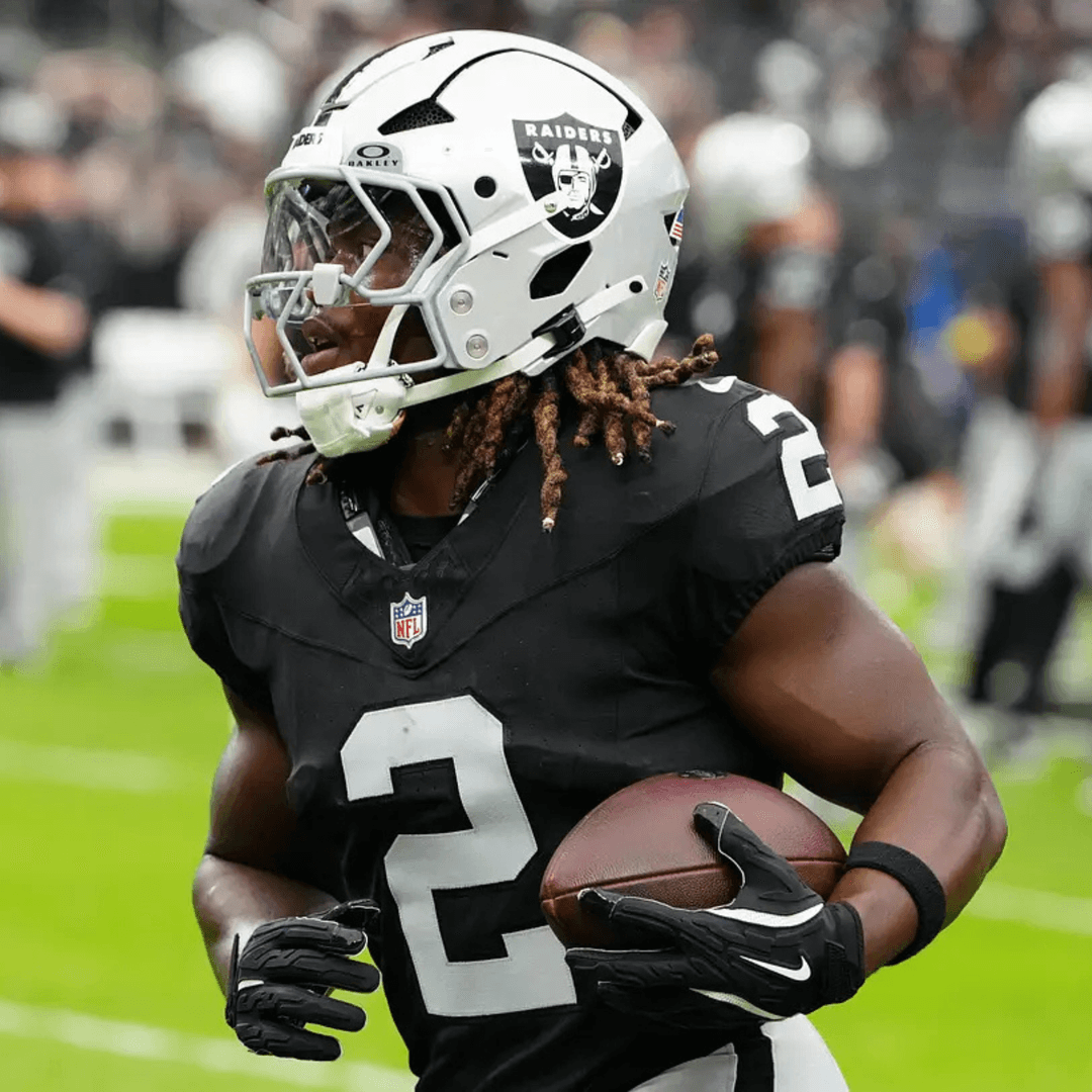 Ashton Jeanty carrying the football for the Las Vegas Raiders