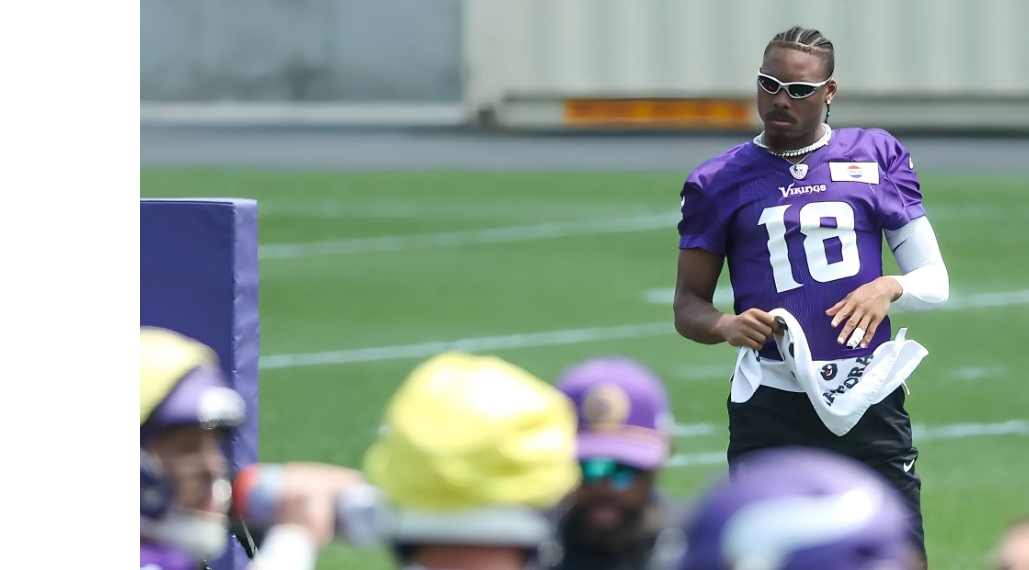 NFC North Camp Watch hero image featuring Justin Jefferson at Minnesota Vikings training camp.