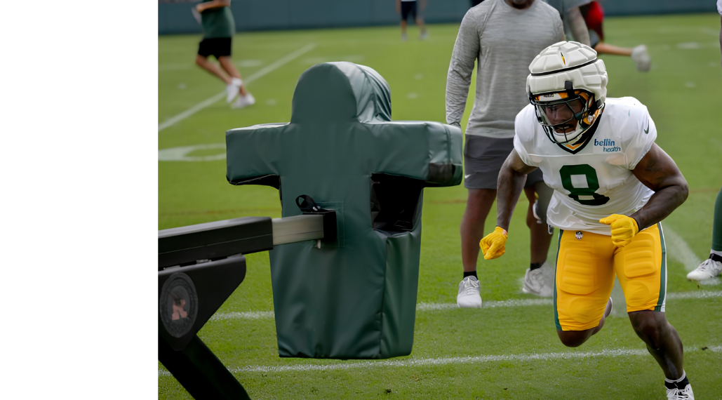 Around the League Camp Injuries FAZE Feed hero featuring Green Bay Packers running back Josh Jacobs at practice.
